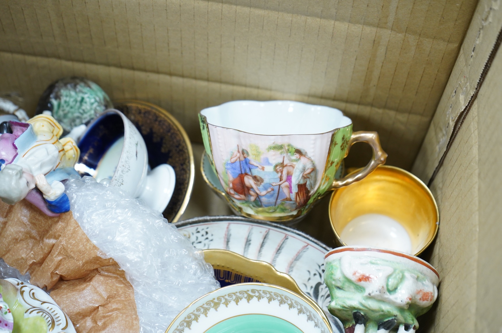 A collection of mixed ceramics including a Dresden figure and cabinet cups and saucers